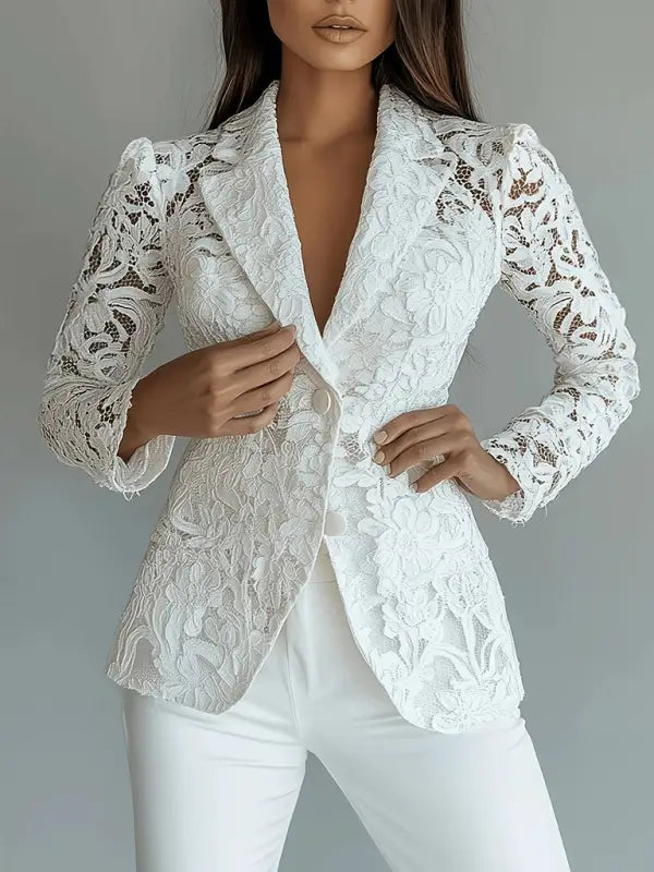 White lace blazer worn by a model against a neutral background